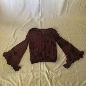 Purple tie-dye, bell sleeve blouse.